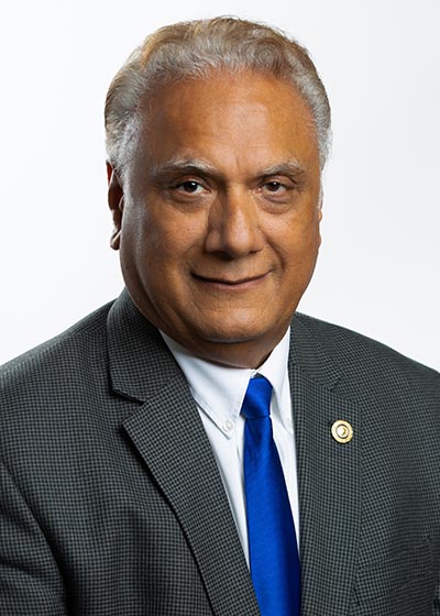 Dr. Charan Shikh - Board of Trustees